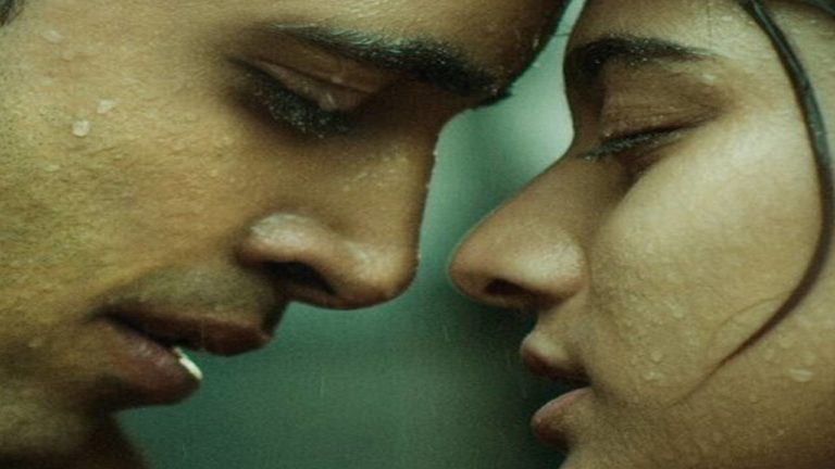 Adivi Sesh romantic pose with Saiee Manjrekar